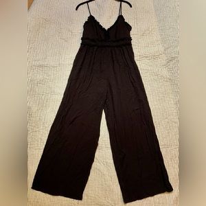 Black jumpsuit with ruffles
